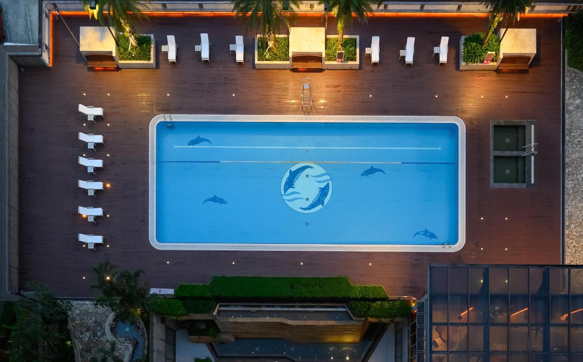 فندق منتجع جياوسي إيفرجرين جياوكسي المظهر الخارجي الصورة The pool at the Dolphinarium