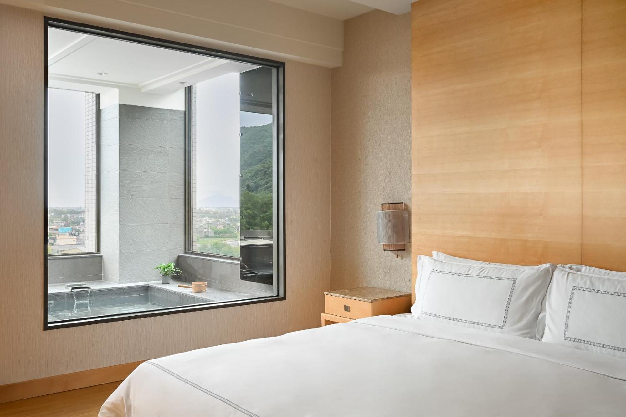 فندق منتجع جياوسي إيفرجرين جياوكسي المظهر الخارجي الصورة A room at the hotel